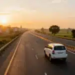 Delhi to Haridwar highway drive at sunrise with SUV on open road